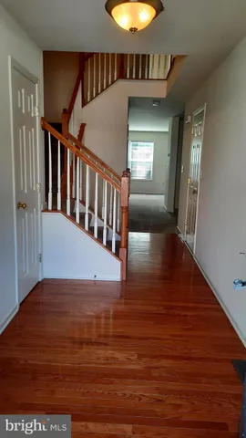 a view of entryway with a front door