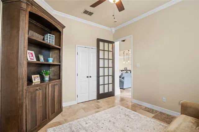 a view of a livingroom with shelves