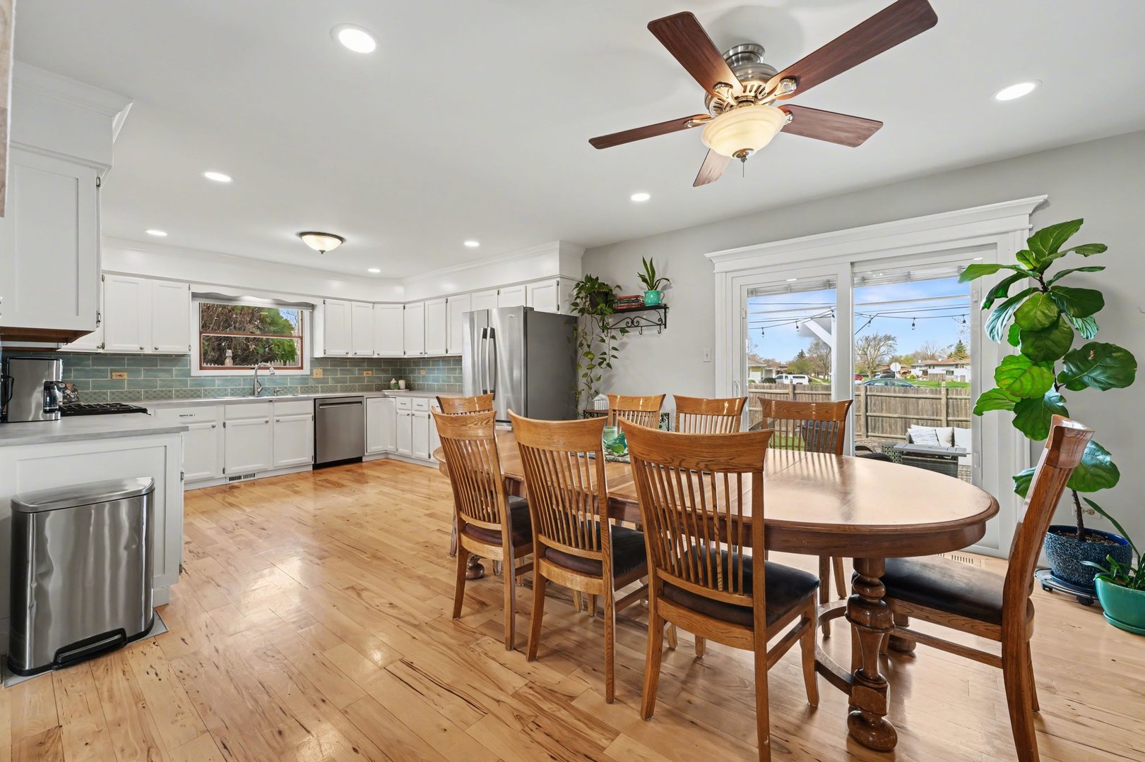 3604 192nd Street Lansing, IL 60438 - Photo 9 of 29 a view of a dining room with furniture and a kitchen