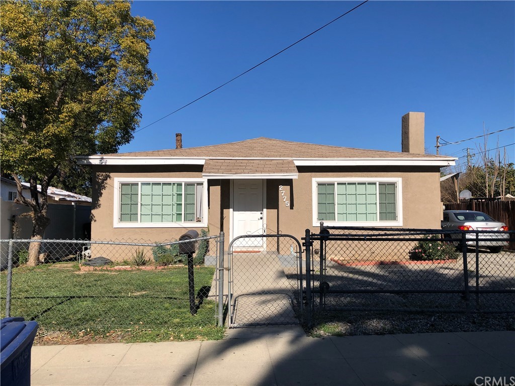 2775 12th Street Riverside, CA 92507 - Photo 1 of 1 a view of a house with backyard and sitting area