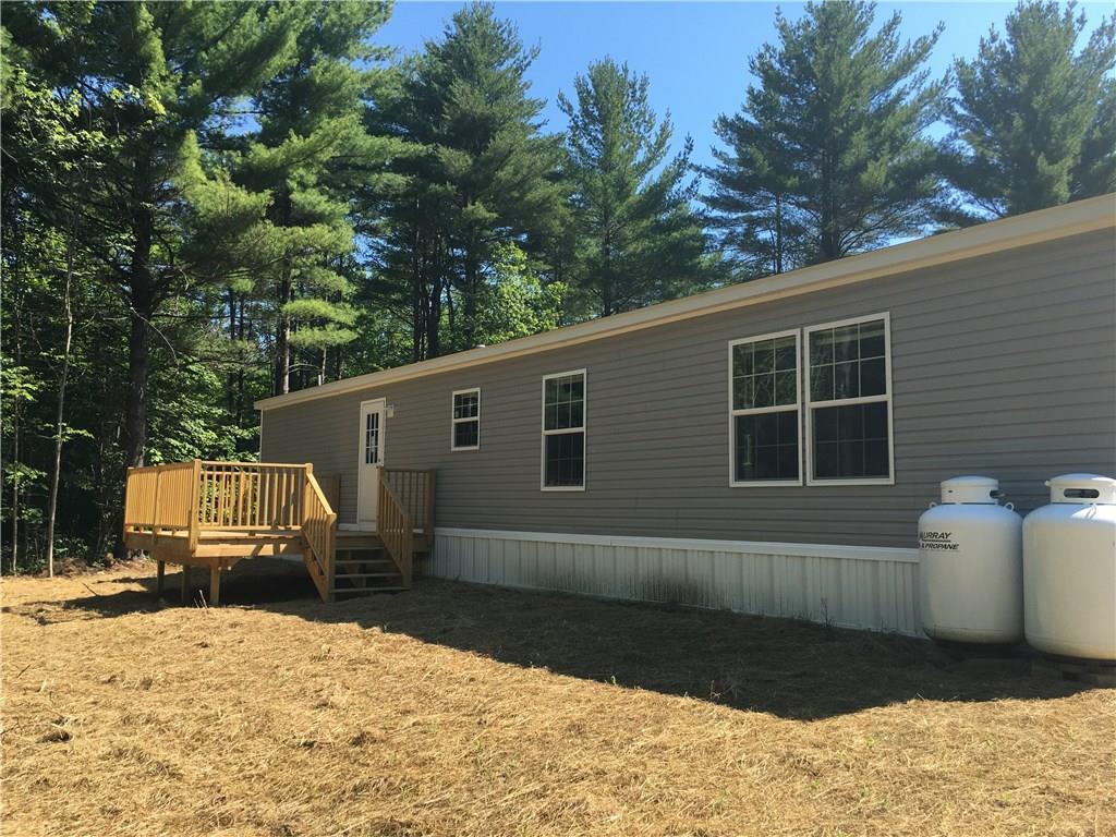 4 Fish Leeds, ME 04263 - Photo 2 of 10 deck and rear of the home