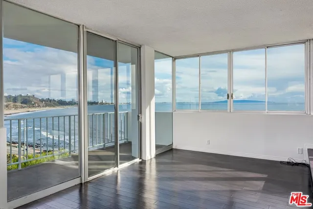 a view of a living room and dining room