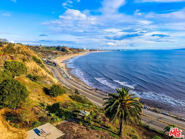 a view of yard with swimming pool