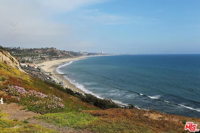 a patio with table and chairs