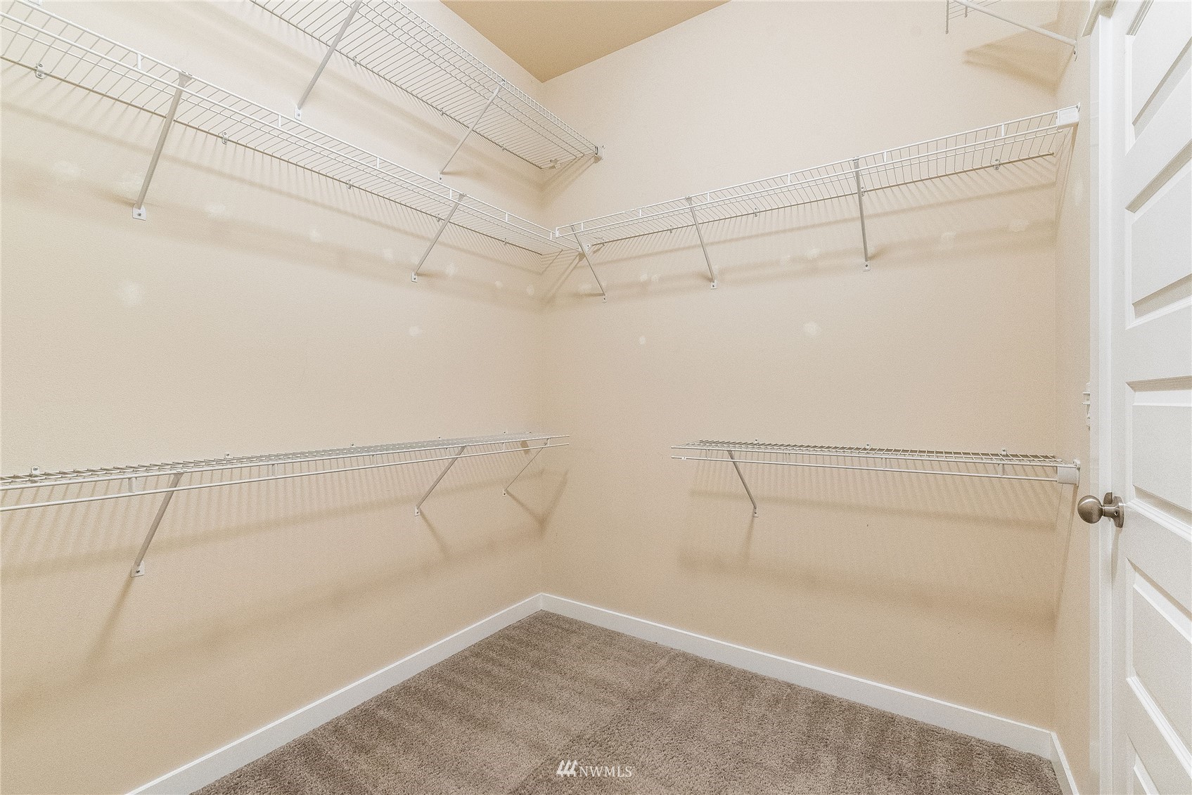 3710 222nd Place Southeast Bothell, WA 98021 - Photo 14 of 37 a view of a room with racks on the wall