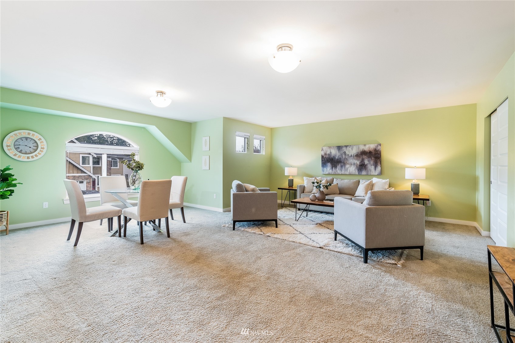 3710 222nd Place Southeast Bothell, WA 98021 - Photo 17 of 37 a living room with furniture and a wooden floor