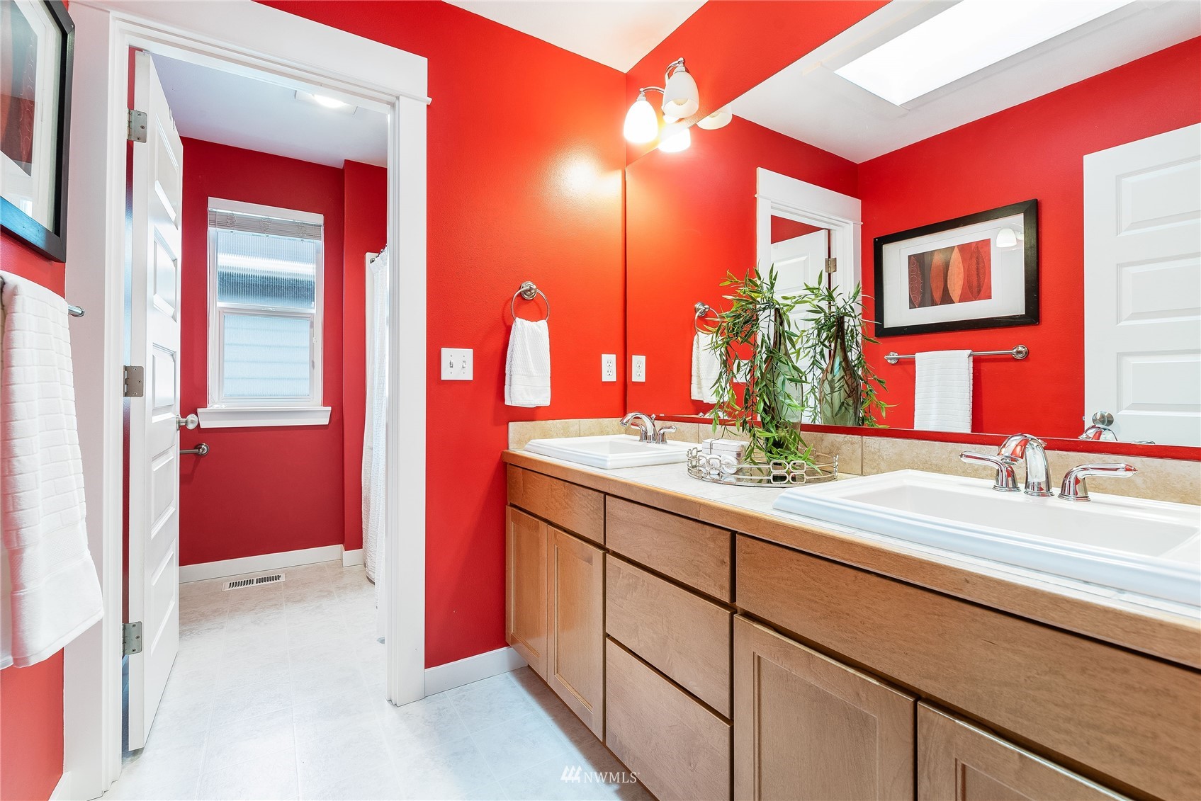 3710 222nd Place Southeast Bothell, WA 98021 - Photo 22 of 37 a bathroom with a sink and a mirror