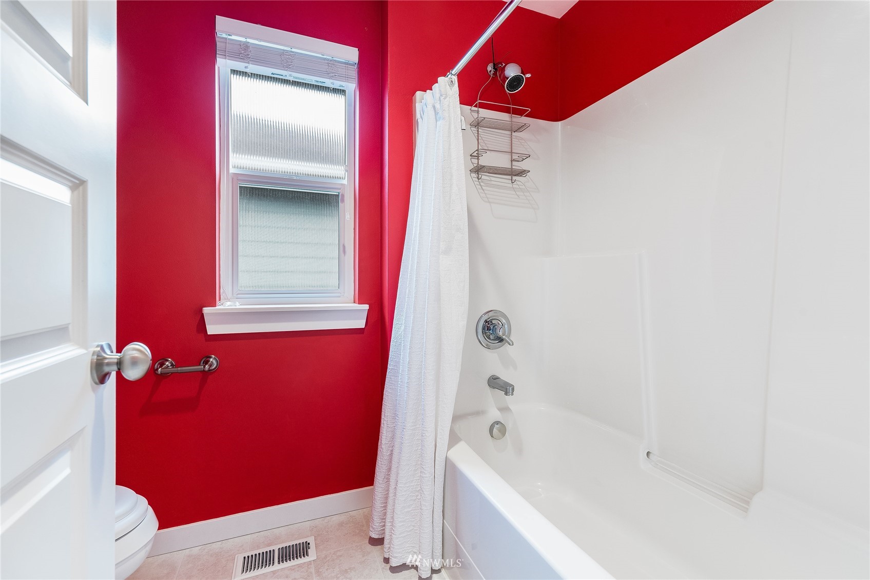 3710 222nd Place Southeast Bothell, WA 98021 - Photo 23 of 37 a bathroom with a bathtub shower sink vanity and toilet