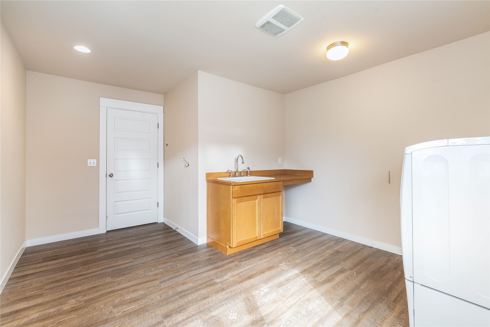 3710 222nd Place Southeast Bothell, WA 98021 - Photo 25 of 37 a view of a room with wooden floor and a sink