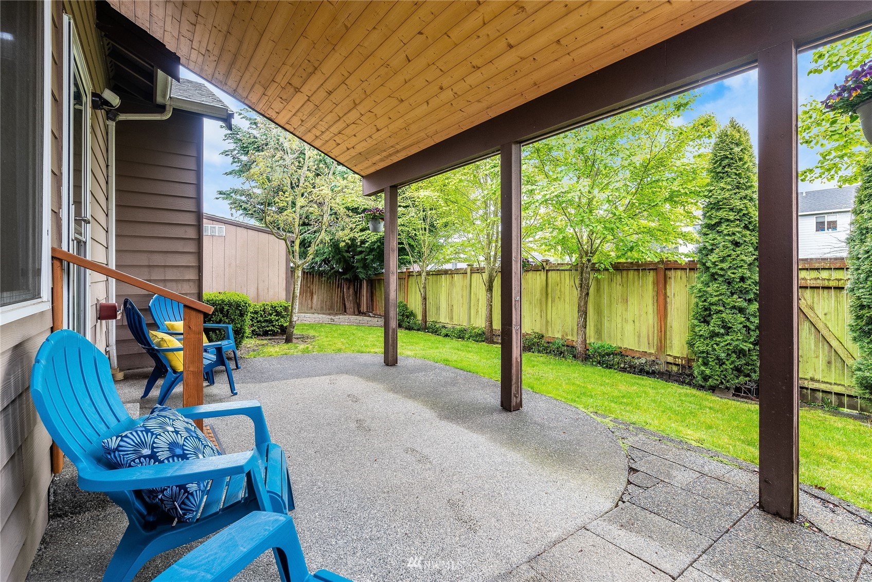 3710 222nd Place Southeast Bothell, WA 98021 - Photo 31 of 37 a view of a chair and table in the patio with a backyard