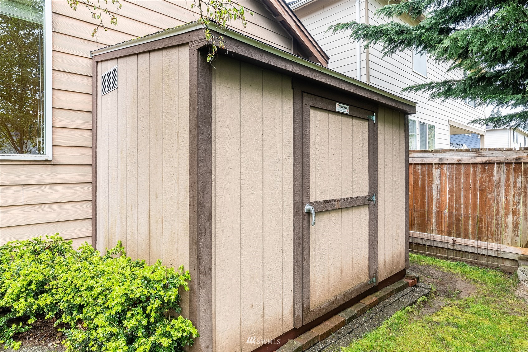 3710 222nd Place Southeast Bothell, WA 98021 - Photo 33 of 37 a view of a house with a backyard and a door