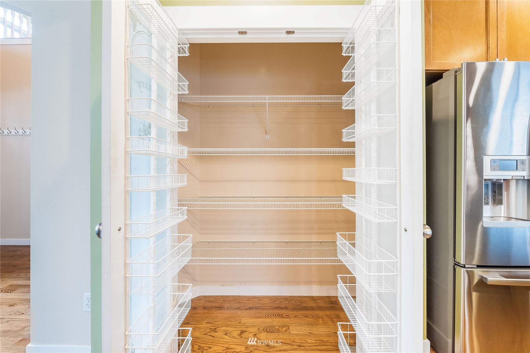 3710 222nd Place Southeast Bothell, WA 98021 - Photo 6 of 37 a view of walk in closet with empty racks