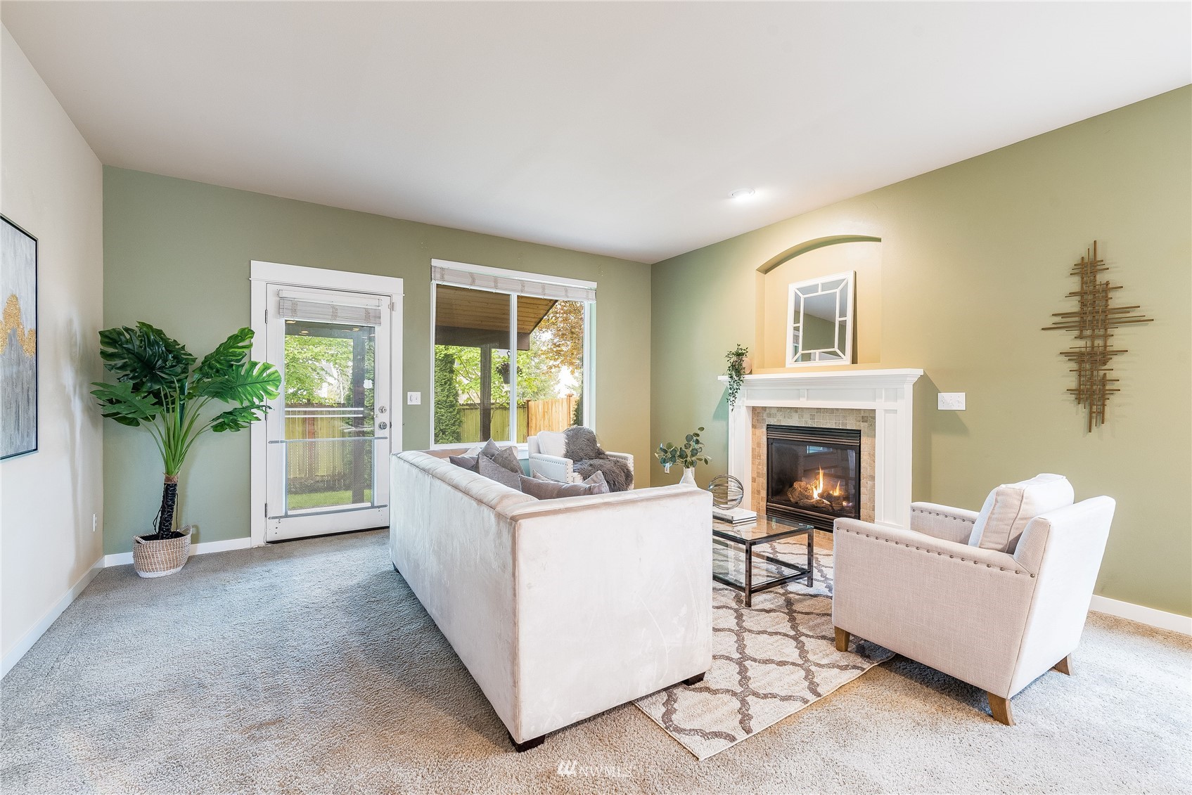 3710 222nd Place Southeast Bothell, WA 98021 - Photo 10 of 37 a living room with furniture and a fireplace
