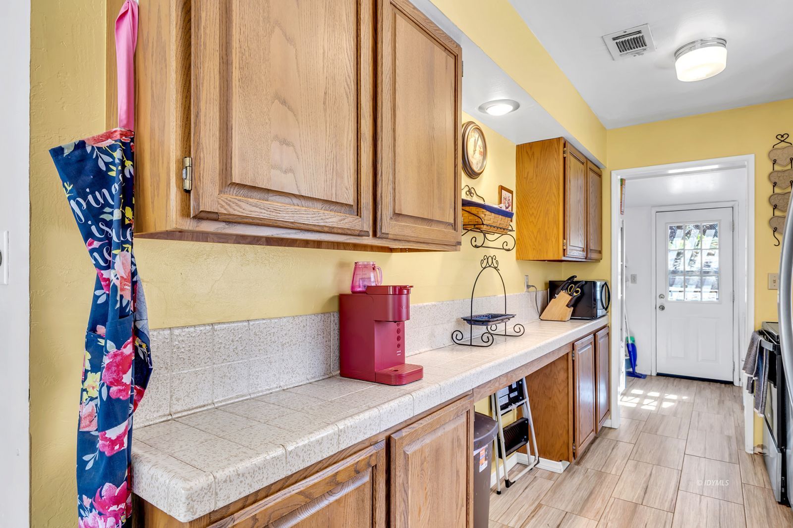 53575 Tollgate Road Idyllwild, CA 92549 - Photo 32 of 71 a kitchen with granite countertop a sink and cabinets