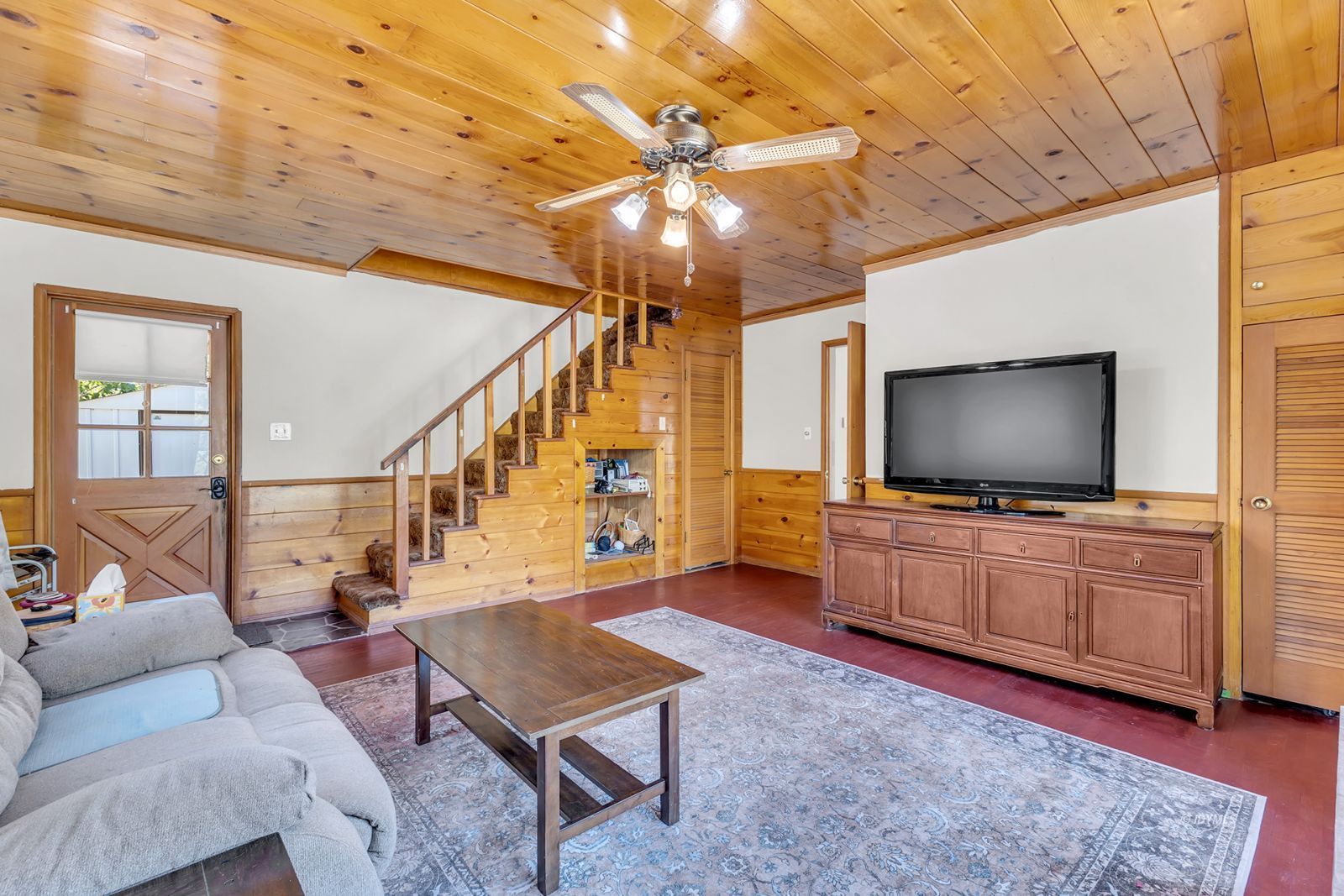 53575 Tollgate Road Idyllwild, CA 92549 - Photo 44 of 71 a living room with furniture and a flat screen tv