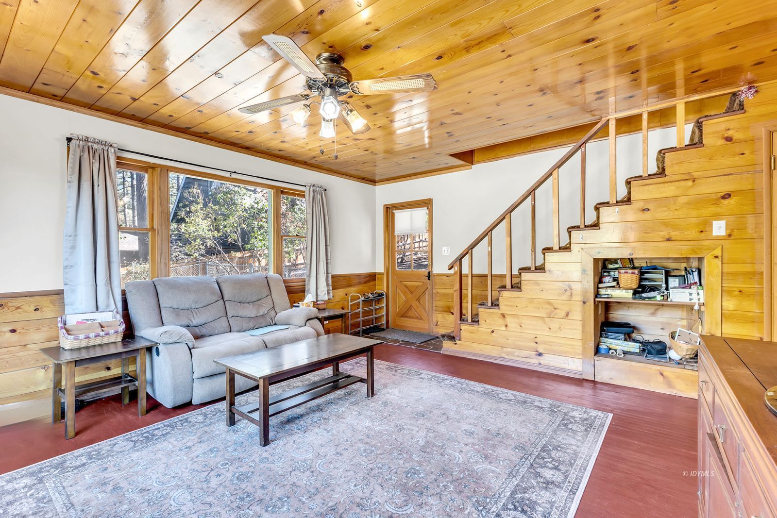 53575 Tollgate Road Idyllwild, CA 92549 - Photo 45 of 71 a living room with furniture and a flat screen tv