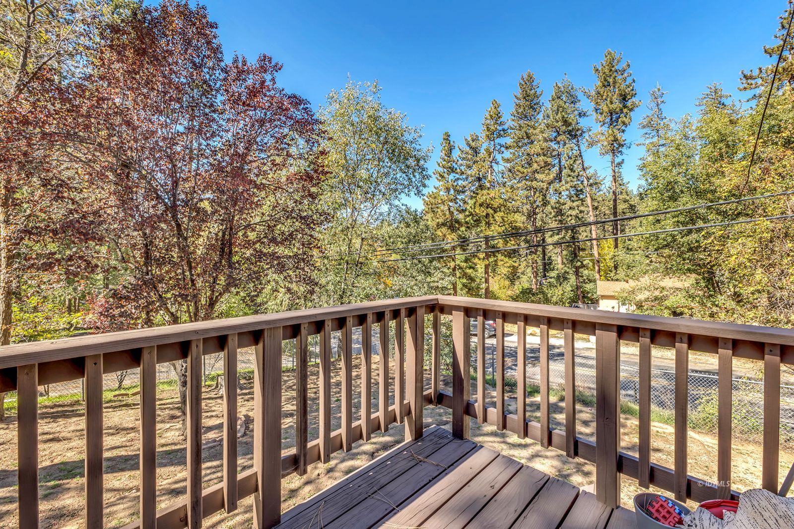 53575 Tollgate Road Idyllwild, CA 92549 - Photo 47 of 71 a balcony with wooden floor and fence