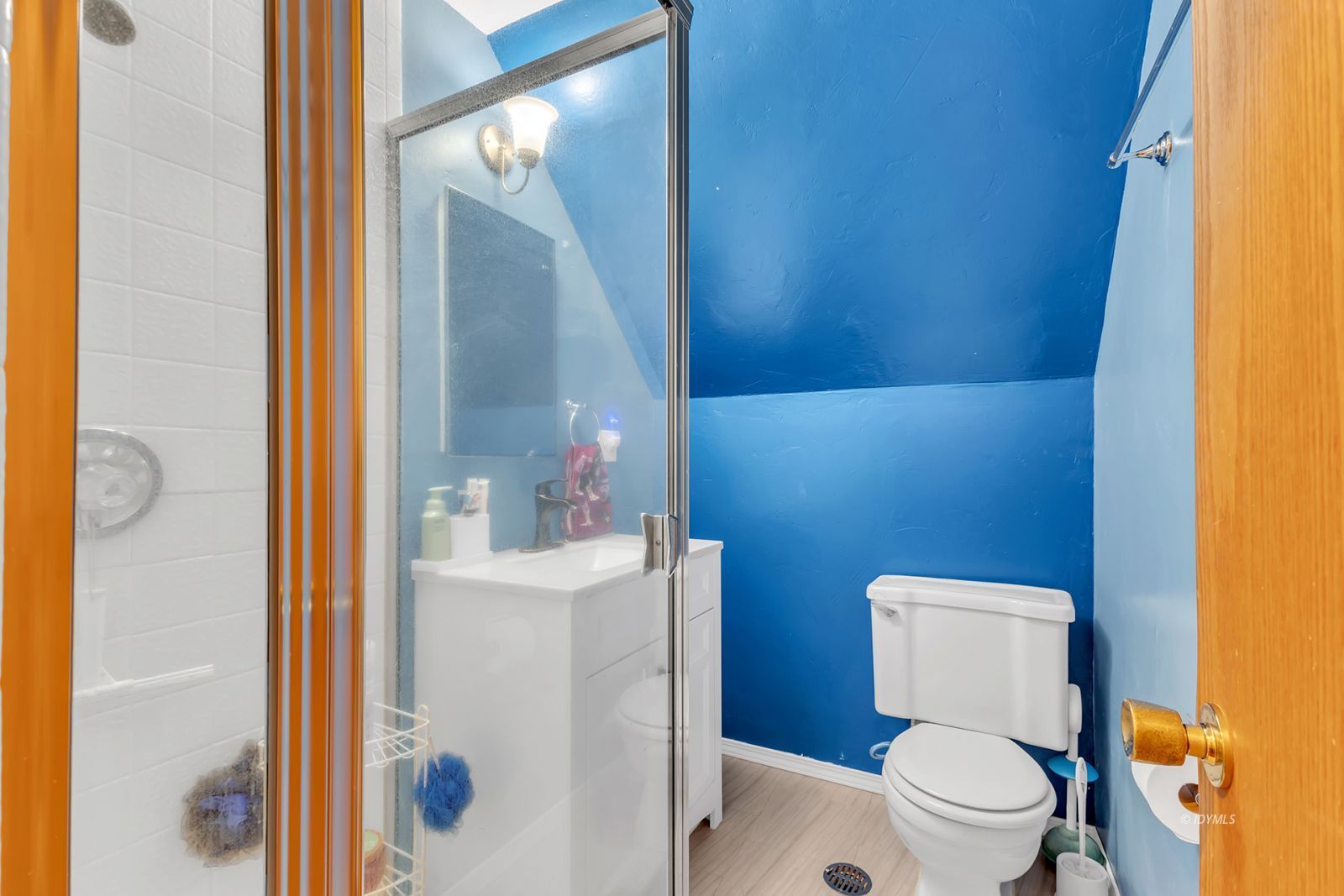 53575 Tollgate Road Idyllwild, CA 92549 - Photo 55 of 71 a bathroom with a toilet a sink and a mirror