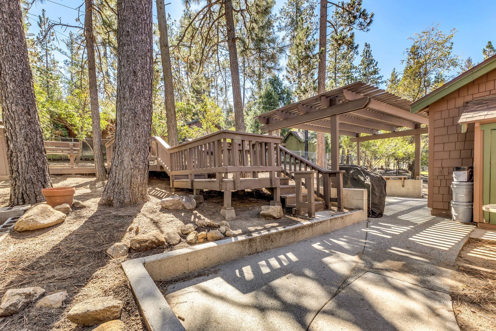 53575 Tollgate Road Idyllwild, CA 92549 - Photo 59 of 71 a view of a house with a chairs in patio