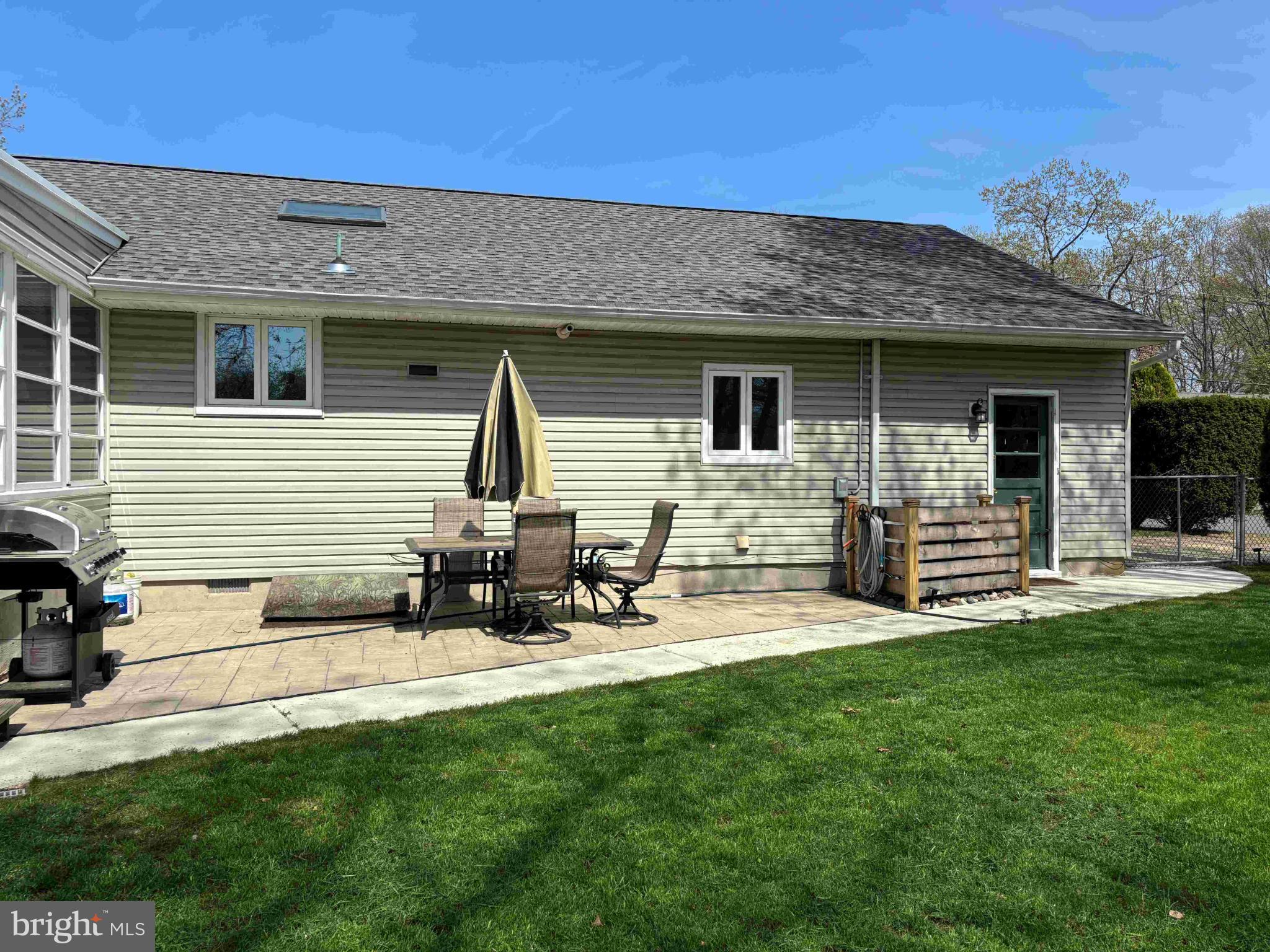 653 Elwood Street Forked River, NJ 08731 - Photo 5 of 33 Charming backyard retreat with sunny patio.