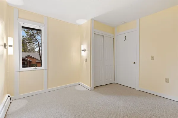 an empty room with a hallway
