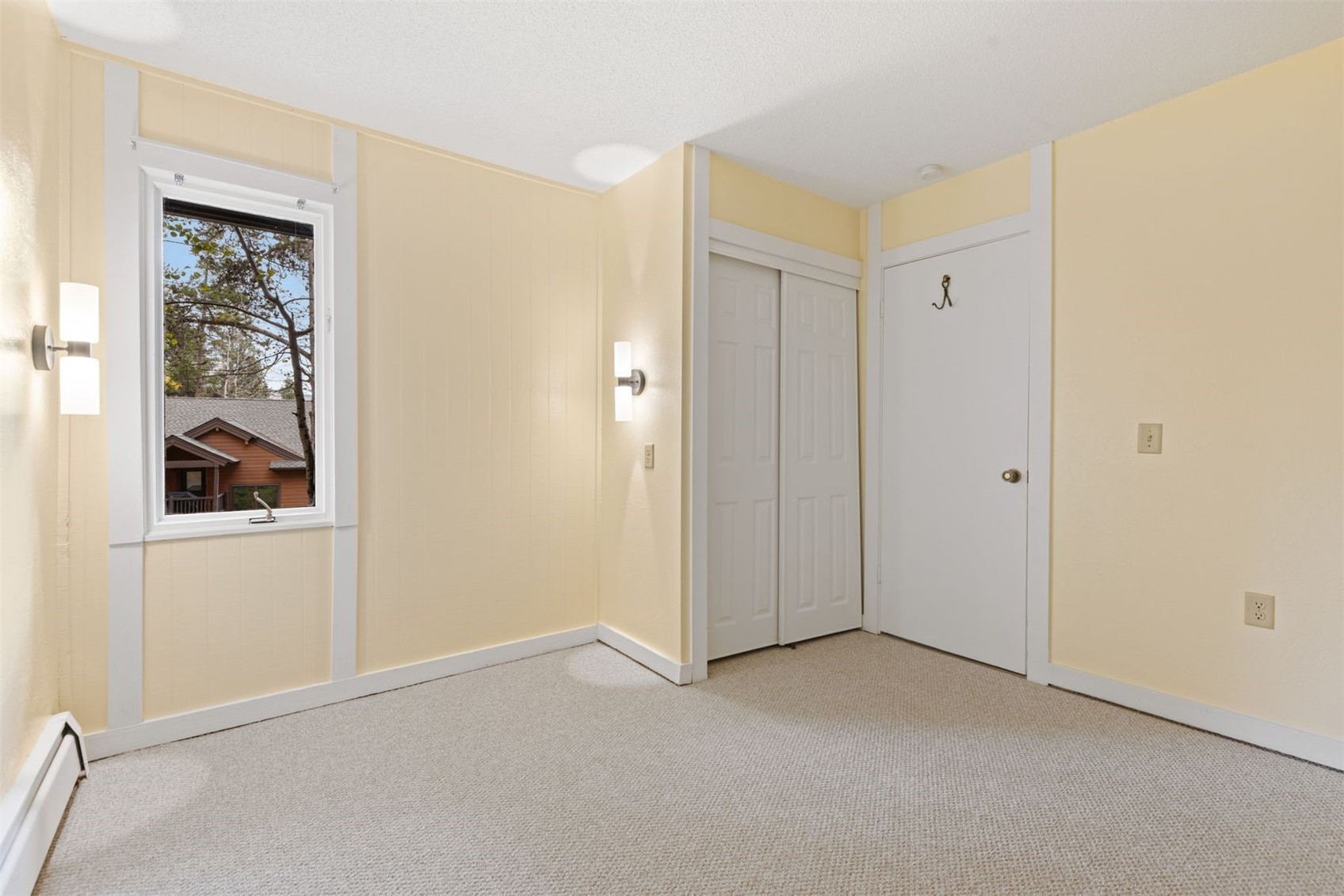 1127 Ski Hill Road, Unit 94 Breckenridge, CO 80424 - Photo 12 of 36 an empty room with windows
