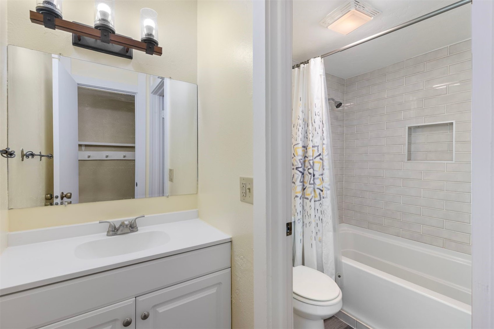 1127 Ski Hill Road, Unit 94 Breckenridge, CO 80424 - Photo 14 of 36 a bathroom with a sink a toilet and shower