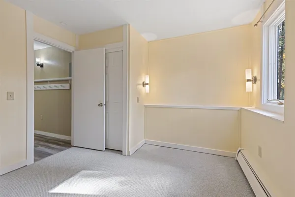 an empty room with cabinet