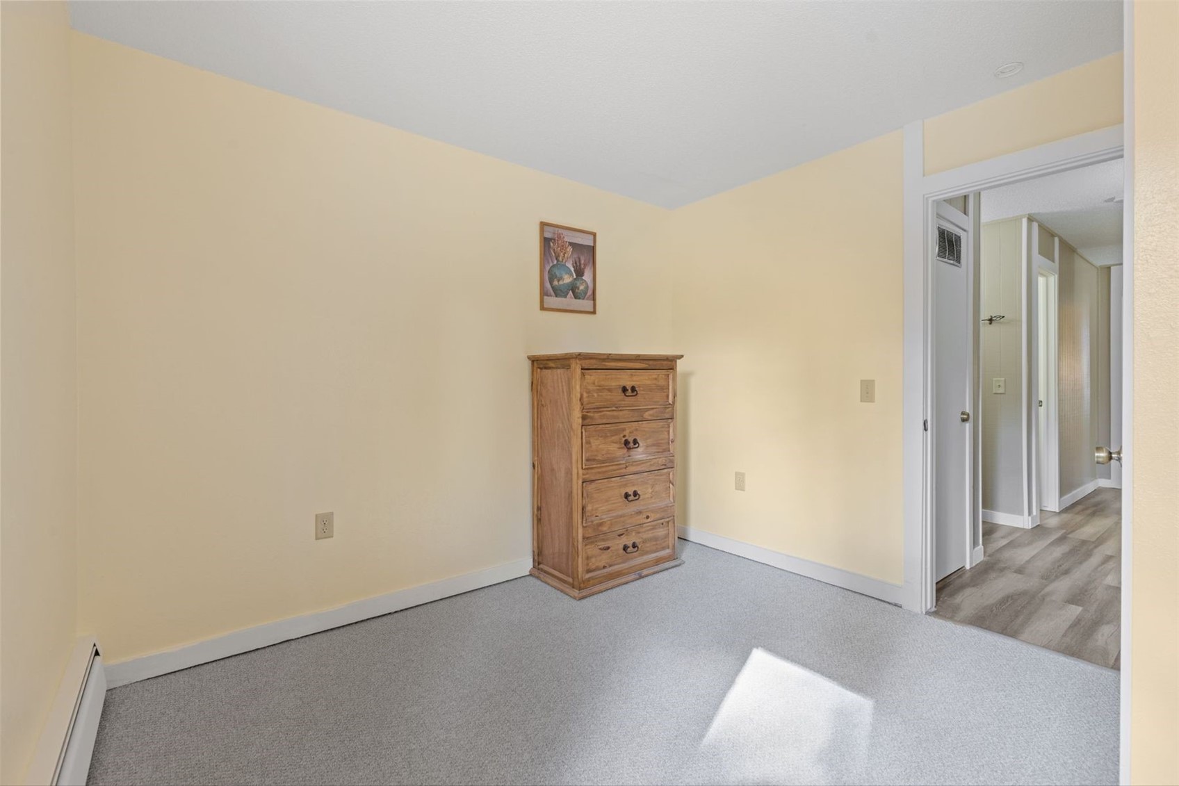 1127 Ski Hill Road, Unit 94 Breckenridge, CO 80424 - Photo 18 of 36 an empty room with cabinet