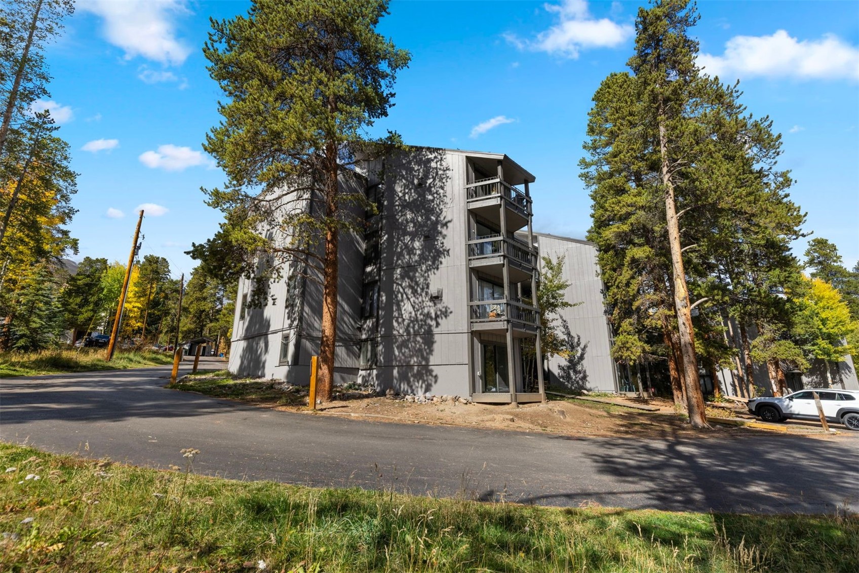 1127 Ski Hill Road, Unit 94 Breckenridge, CO 80424 - Photo 2 of 36 a view of a street with a building