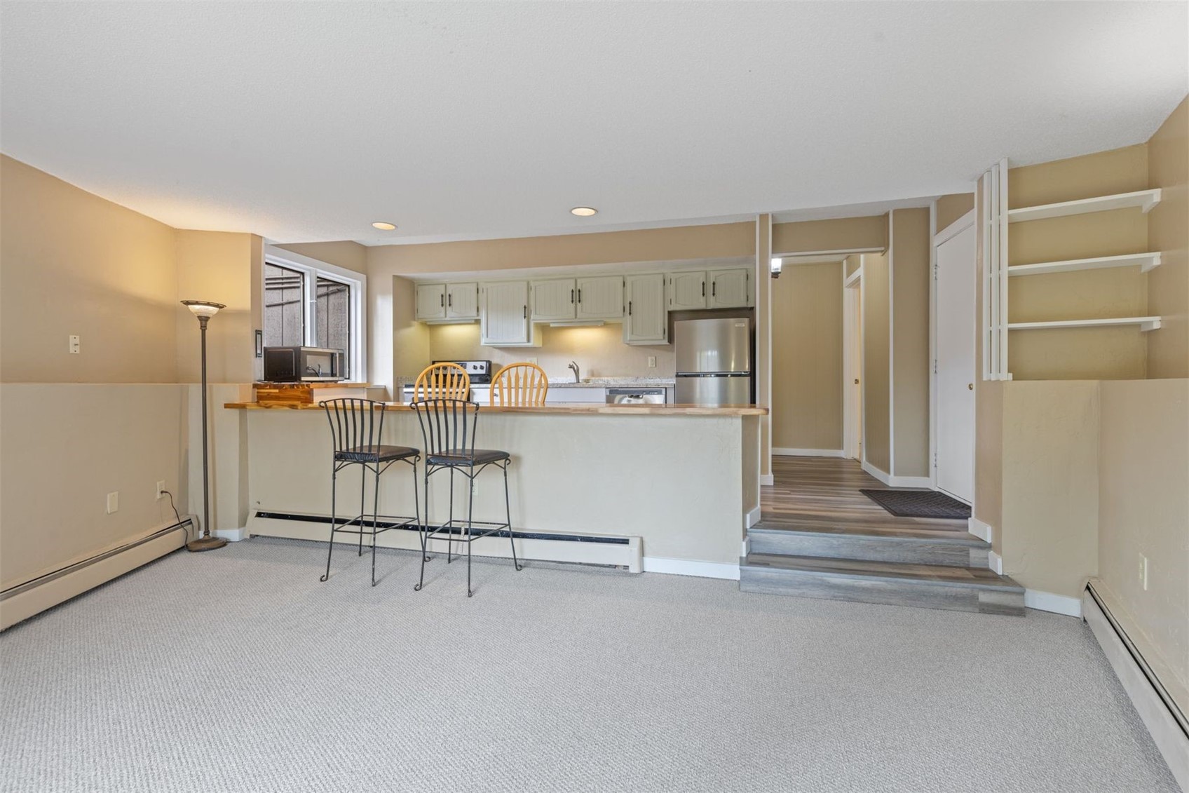 1127 Ski Hill Road, Unit 94 Breckenridge, CO 80424 - Photo 3 of 36 a living room with furniture and a table