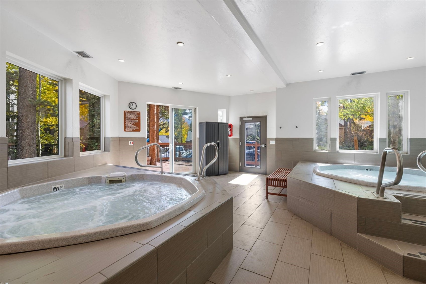 1127 Ski Hill Road, Unit 94 Breckenridge, CO 80424 - Photo 34 of 36 a living room with furniture and a table