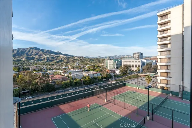 a view of a balcony with wooden floor