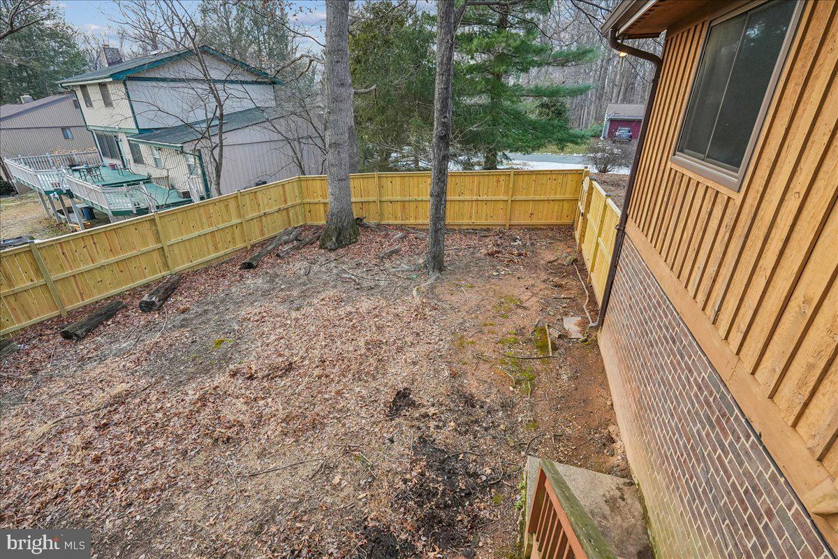 14920 Chestnut Ridge Court North Potomac, MD 20878 - Photo 29 of 32 a view of balcony with wooden floor