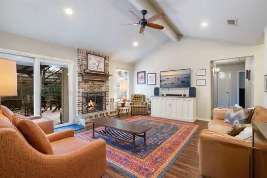 2000 Navajo Street Denton, TX 76209 - Photo 1 of 1 a living room with furniture a flat screen tv and a fireplace