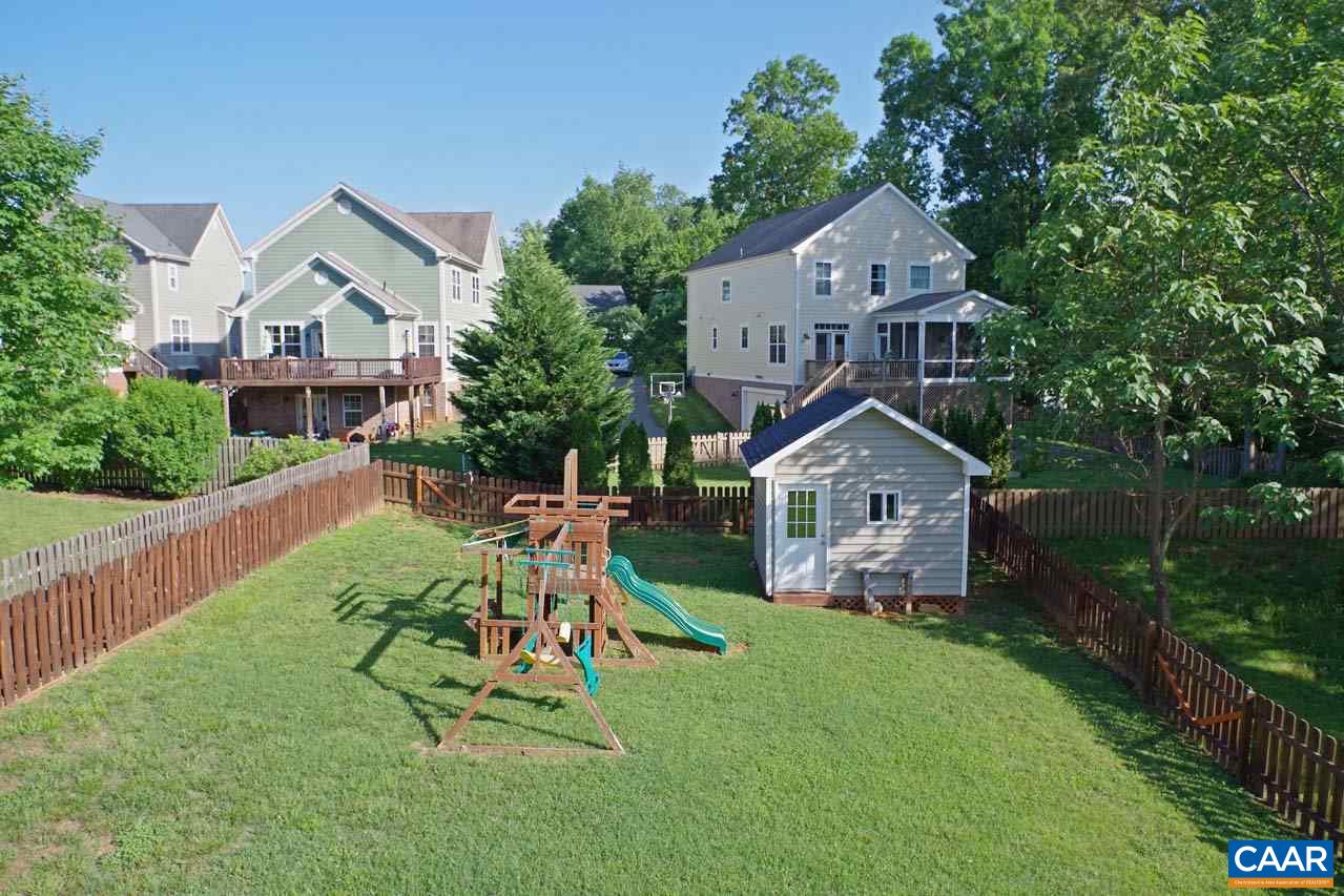 5477 Park Road Crozet, VA 22932 - Photo 18 of 47 a front view of a house with garden and trees