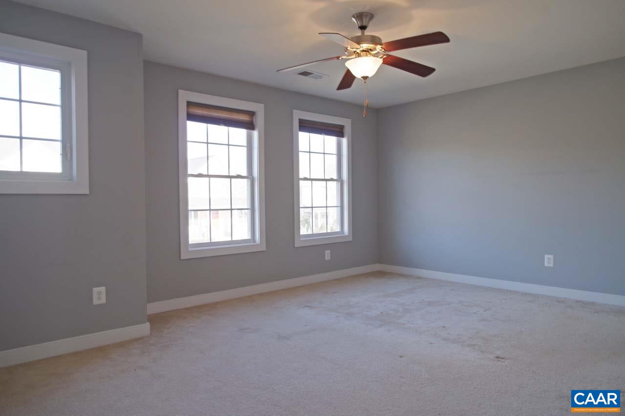 5477 Park Road Crozet, VA 22932 - Photo 21 of 47 an empty room with a window and a fan