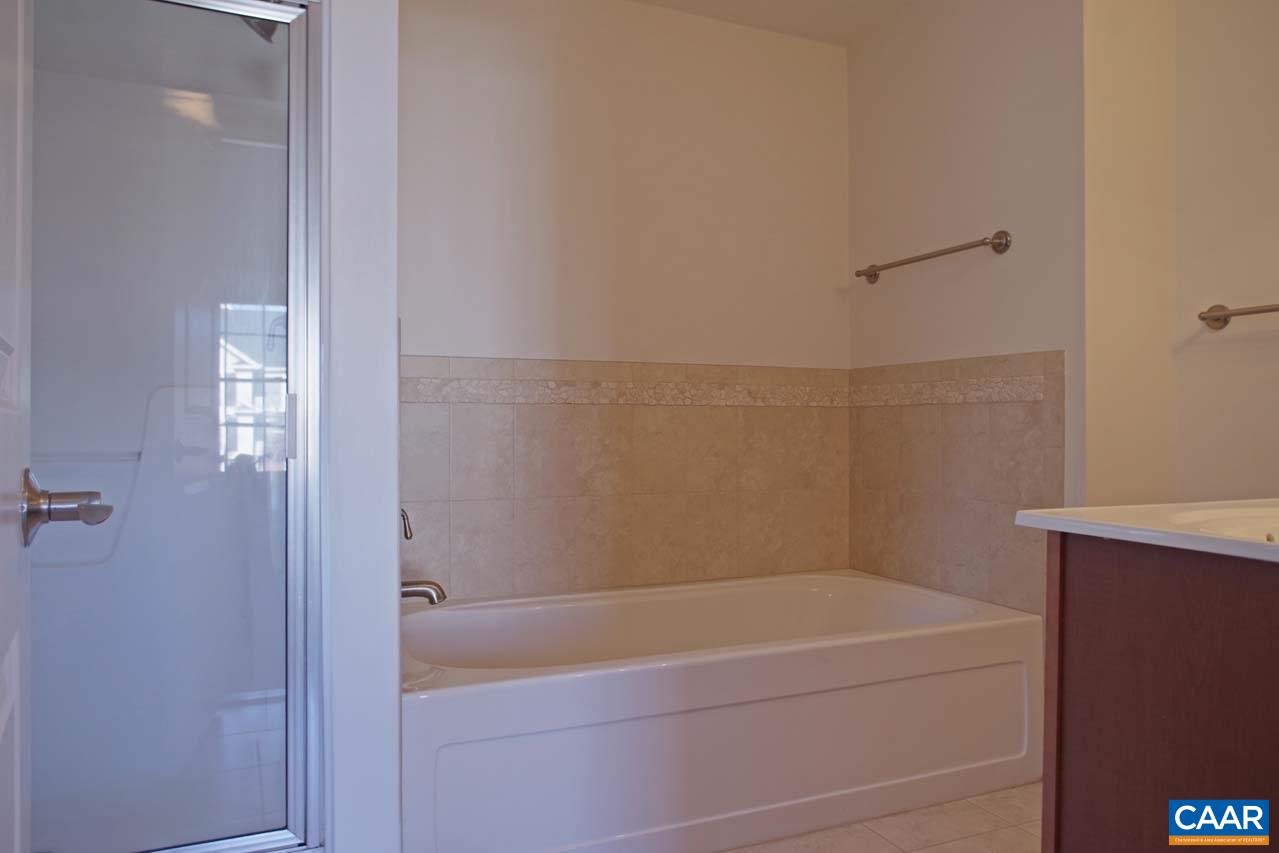 5477 Park Road Crozet, VA 22932 - Photo 25 of 47 a bathroom with a bathtub and a shower