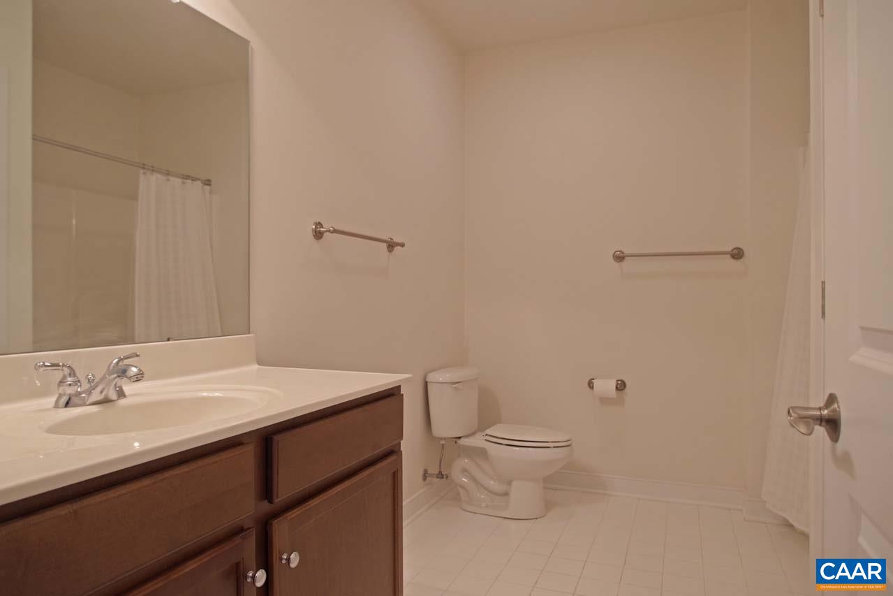 5477 Park Road Crozet, VA 22932 - Photo 39 of 47 a bathroom with a sink a toilet and a mirror