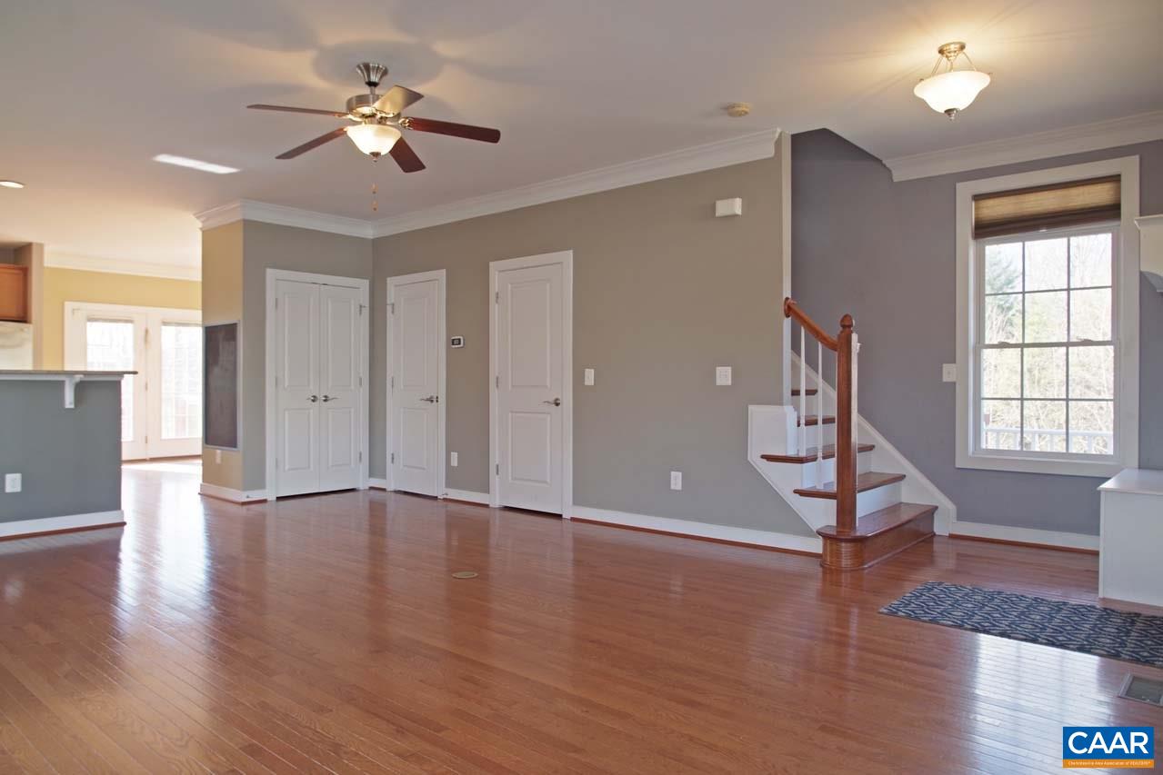 5477 Park Road Crozet, VA 22932 - Photo 6 of 47 a view of an empty room with a window and wooden floor