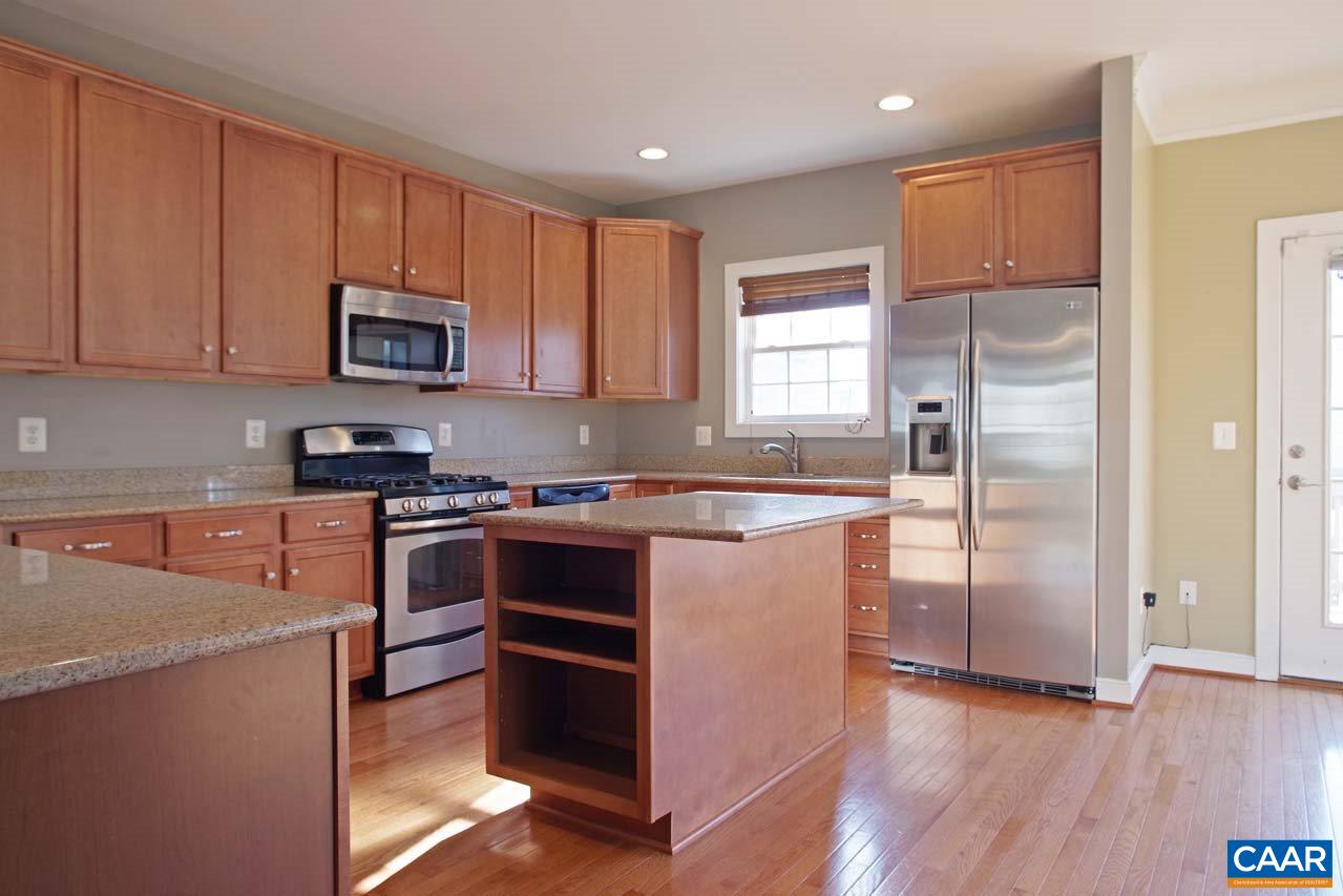 5477 Park Road Crozet, VA 22932 - Photo 10 of 47 a kitchen with stainless steel appliances granite countertop a stove a sink and a refrigerator
