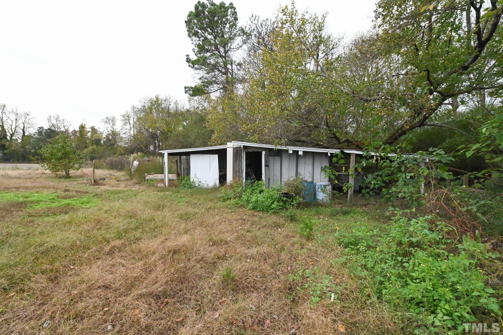 4765 Baileys Crossroads Road Coats, NC 27521 - Photo 33 of 43 a view of a house with backyard
