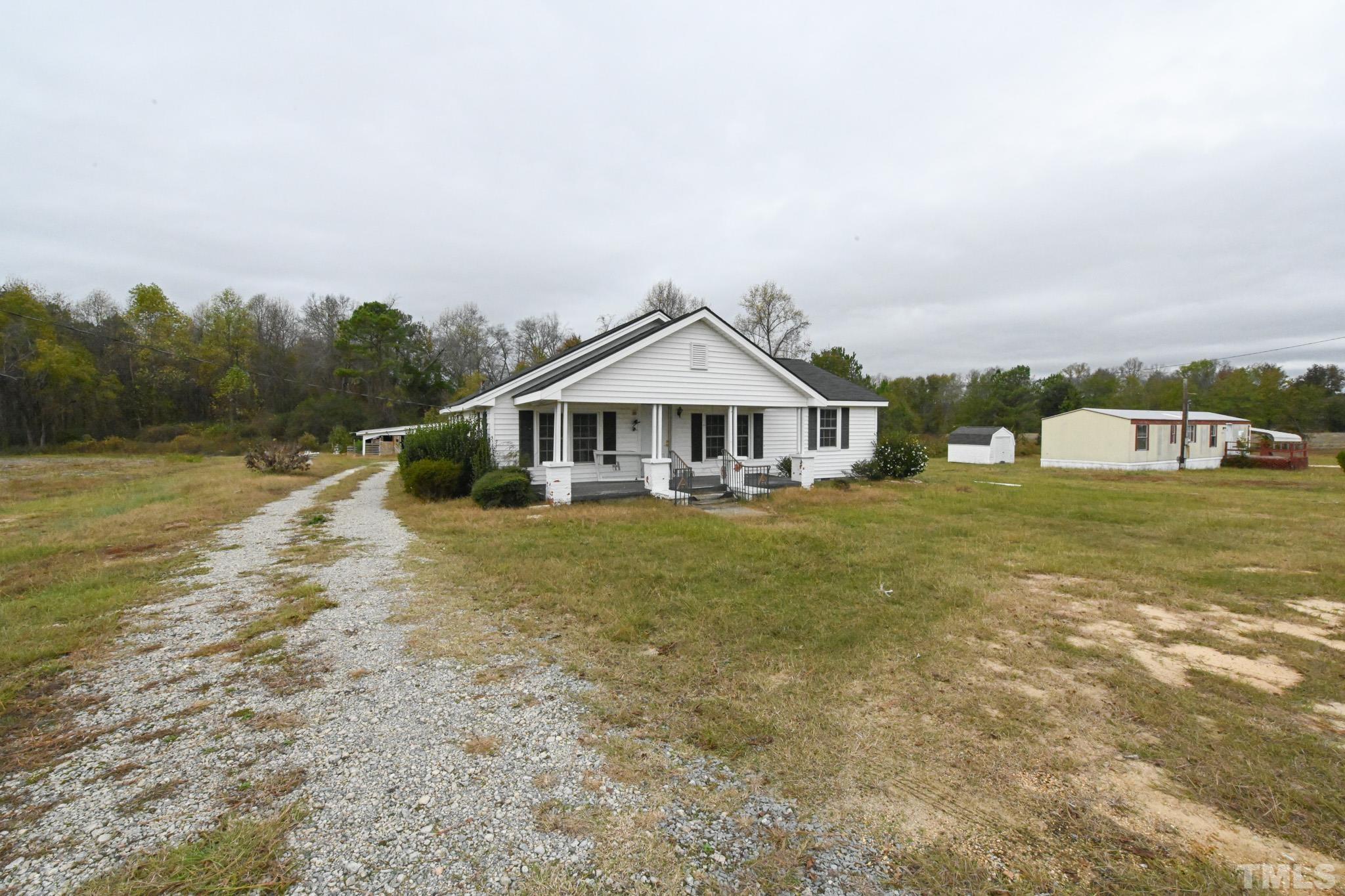 4765 Baileys Crossroads Road Coats, NC 27521 - Photo 35 of 43 a front view of a house with a yard