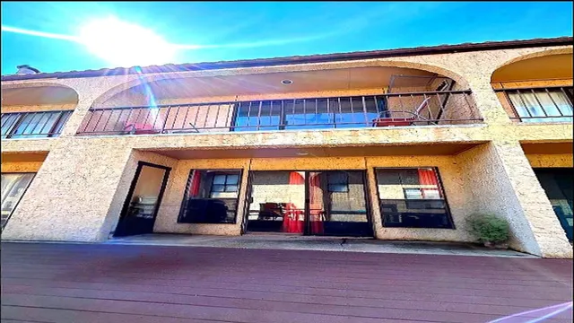 a view of a car park in front of a building