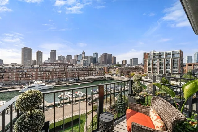 a view of a city skyline from a balcony