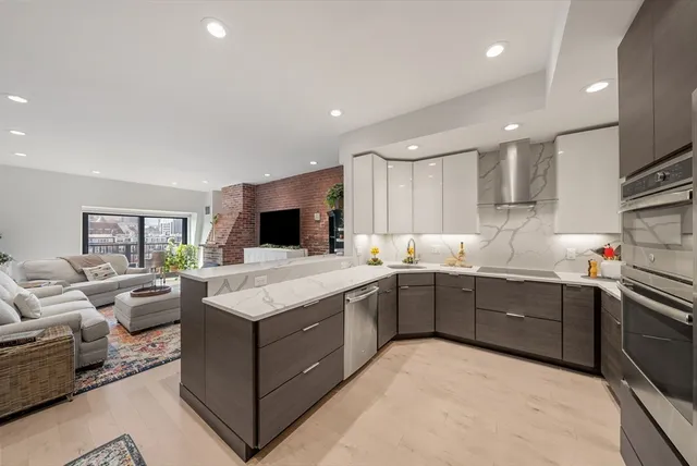 a kitchen with a stove and a sink