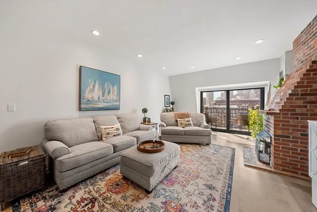 a living room with furniture and a couch