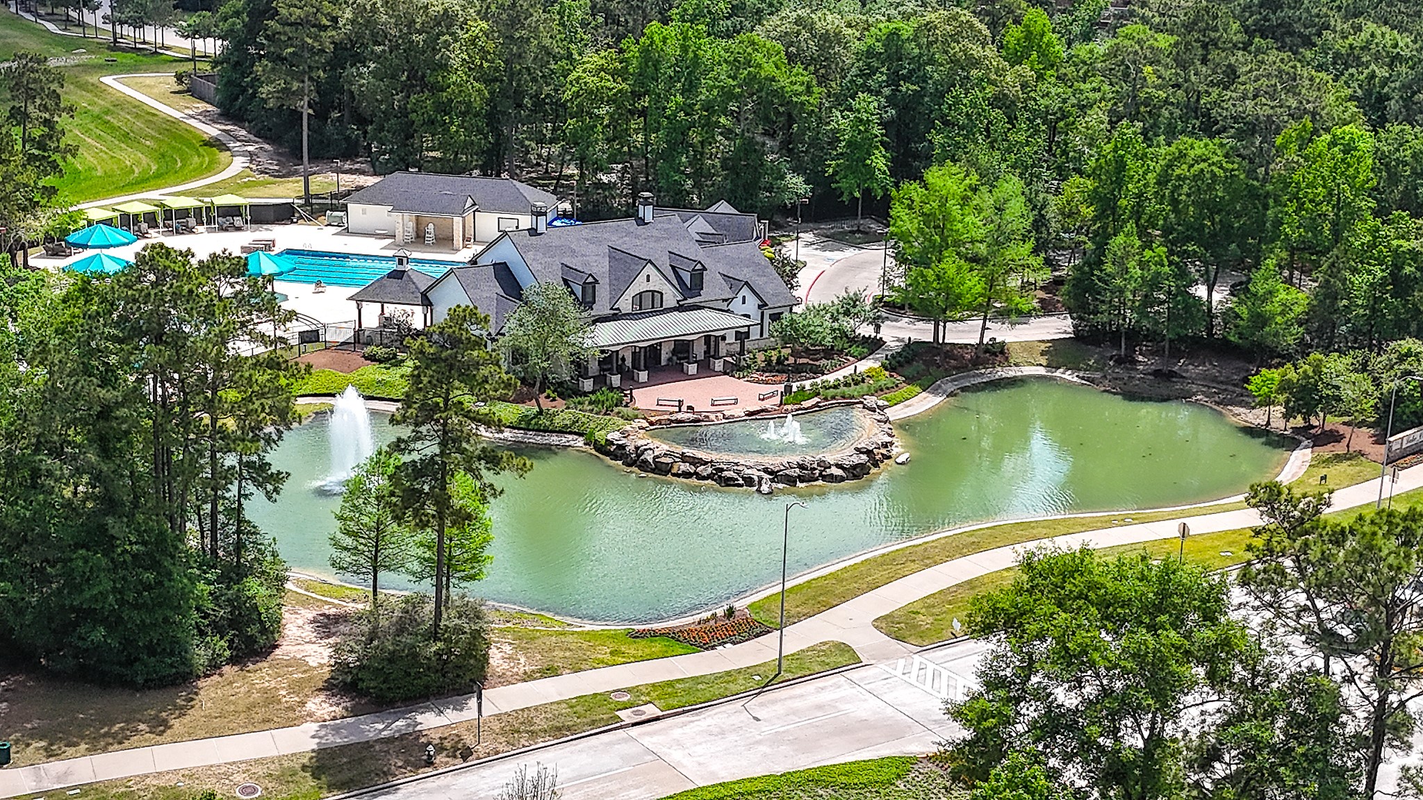31311 Brighton Brook Lane Spring, TX 77386 - Photo 36 of 47 an aerial view of a house with a lake view