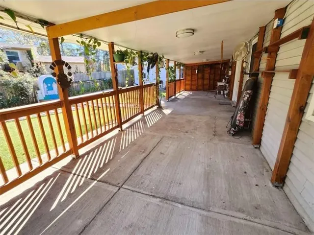 a view of swimming pool in front of residential houses