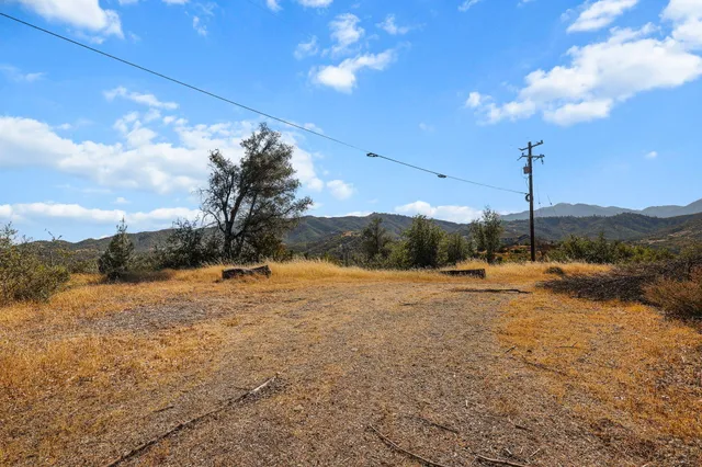 a view of lake with green space